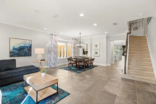 a living room with furniture and a couch