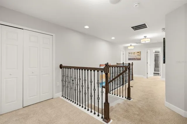 a bathroom with a sink toilet vanity and shower
