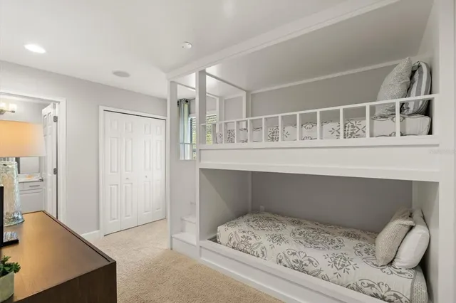 a room with furniture and a flat screen tv