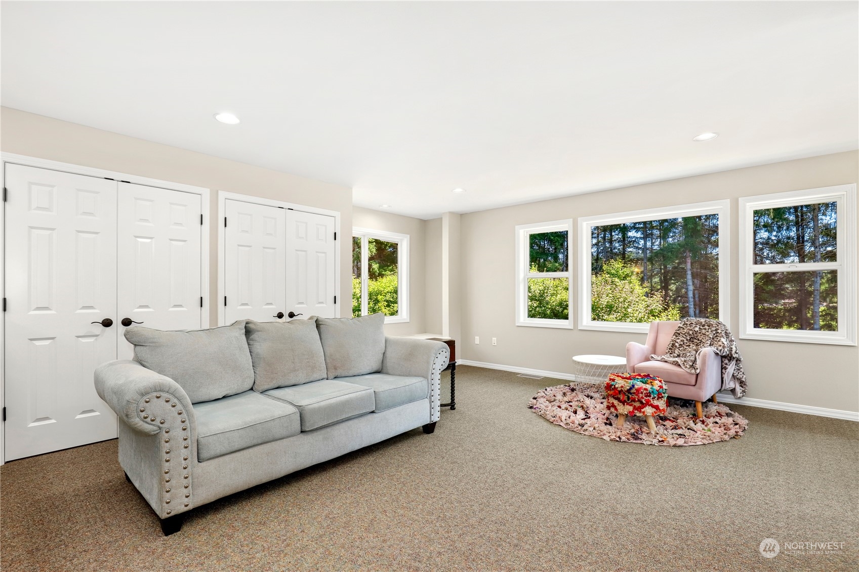 9109 Rich Road Southeast Olympia, WA 98501 - Photo 24 of 40 a living room with furniture and large windows