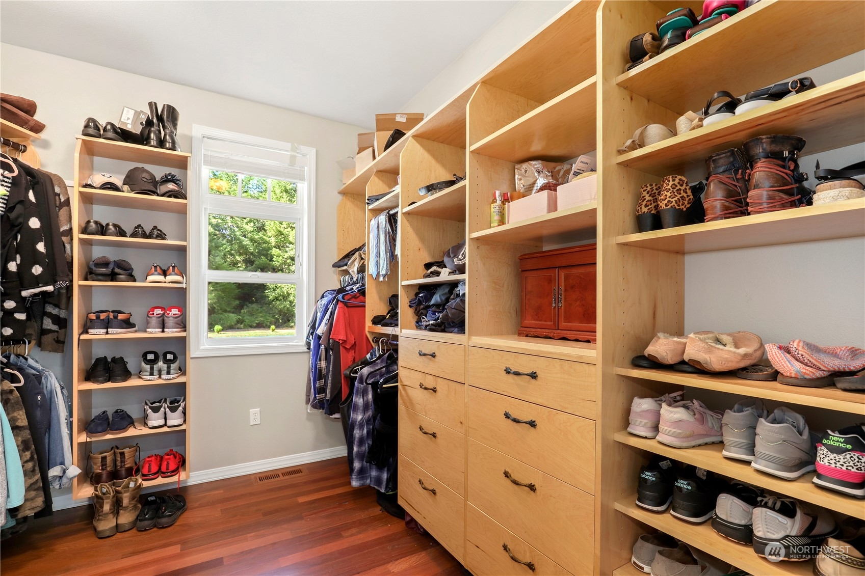9109 Rich Road Southeast Olympia, WA 98501 - Photo 27 of 40 a view of walk in closet with clothes and shoes