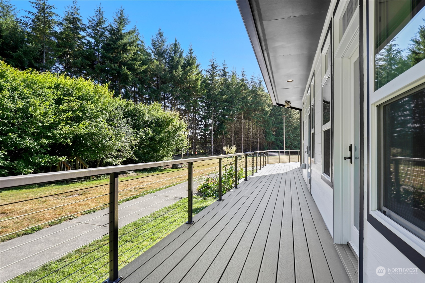 9109 Rich Road Southeast Olympia, WA 98501 - Photo 32 of 40 a view of balcony with wooden floor and fence