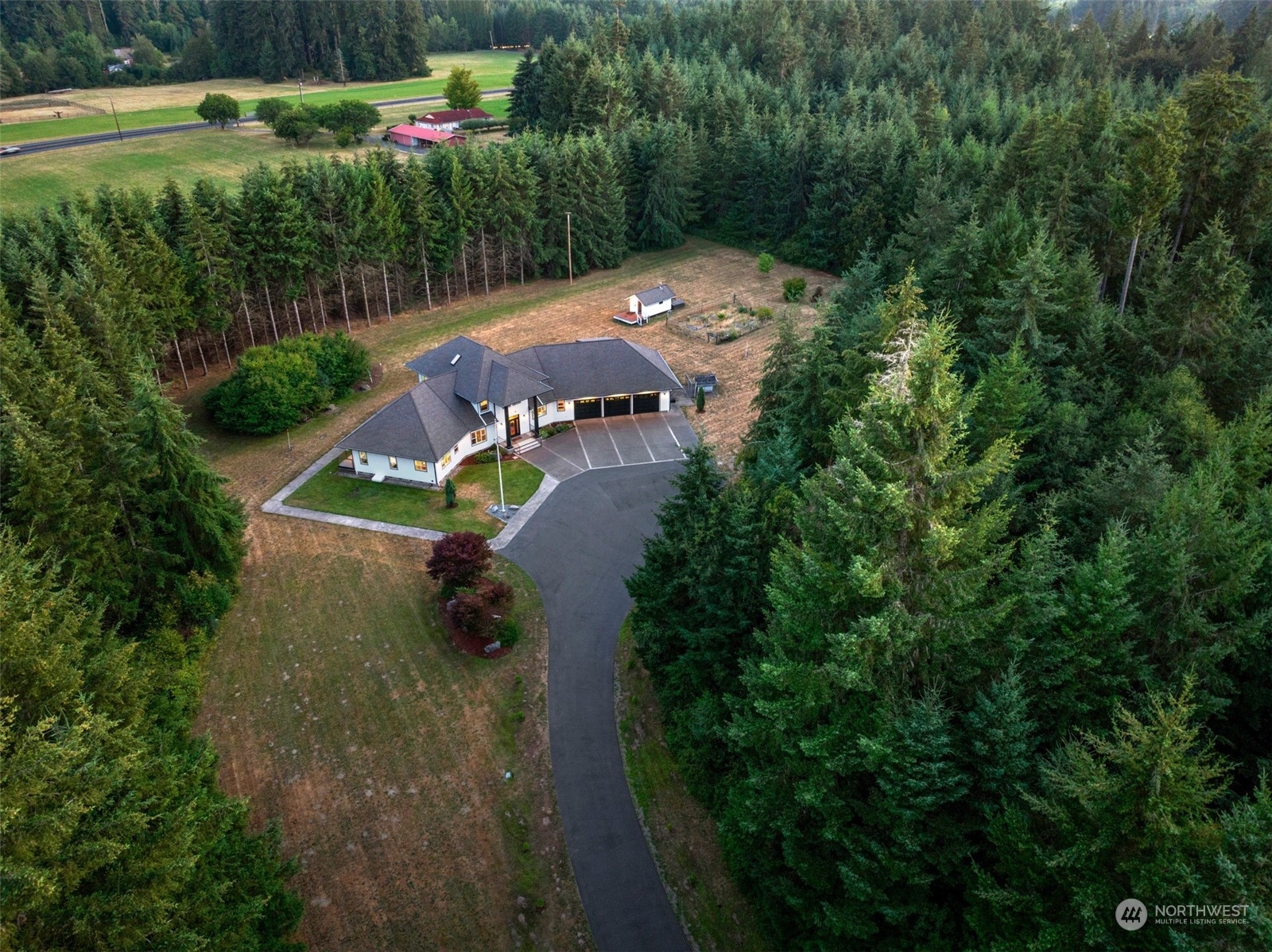 9109 Rich Road Southeast Olympia, WA 98501 - Photo 38 of 40 an aerial view of a house with a yard
