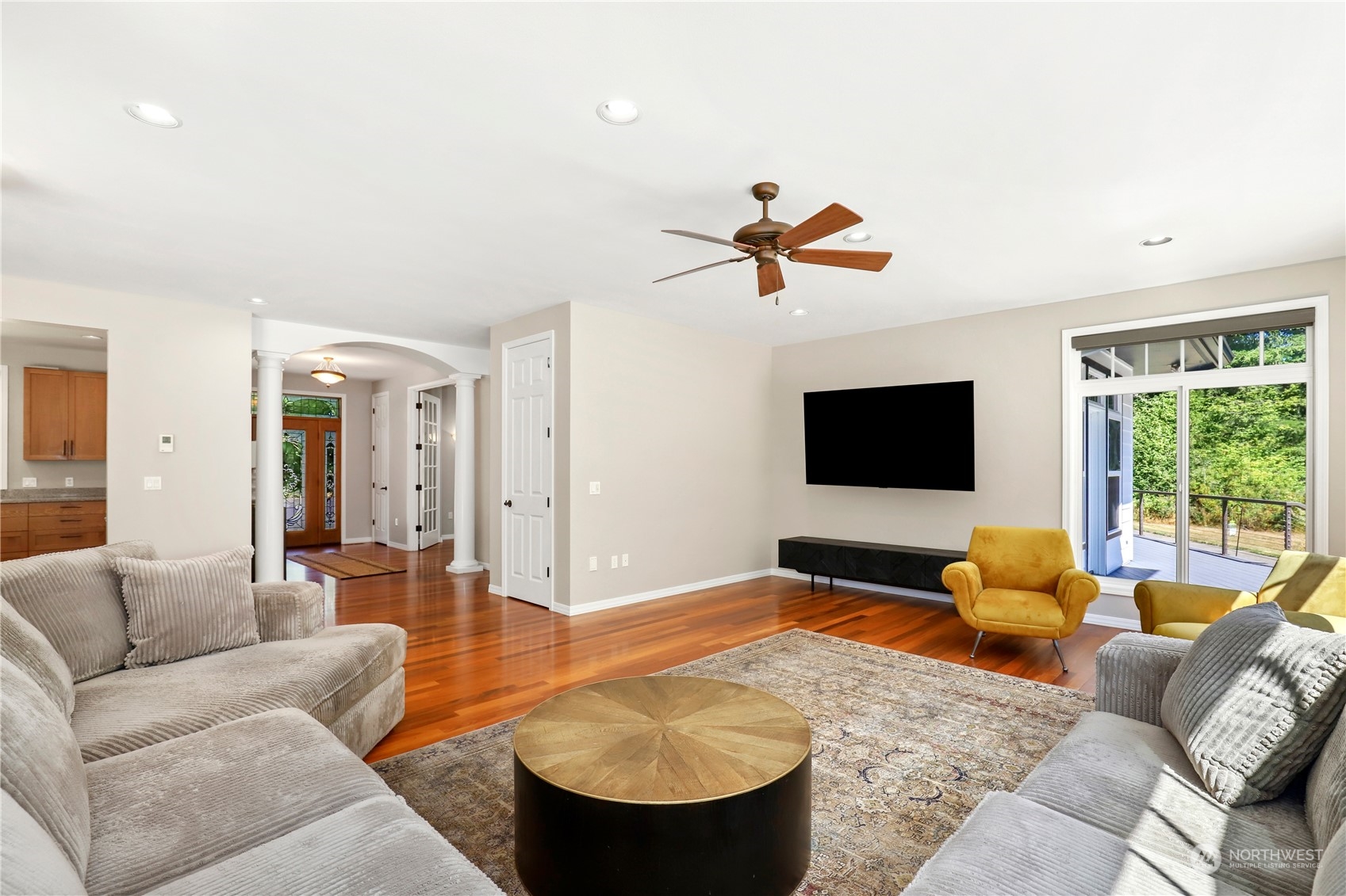 9109 Rich Road Southeast Olympia, WA 98501 - Photo 5 of 40 a living room with furniture and a flat screen tv