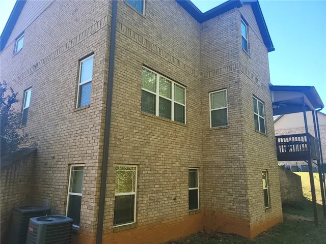 a brick building with a door