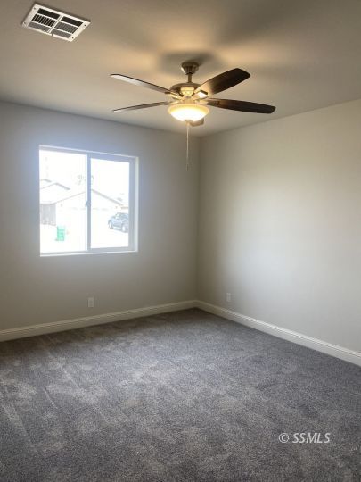 1405 Porter Street Ridgecrest, CA 93555 - Photo 20 of 23 an empty room with a window