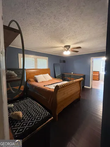 a large kitchen with stainless steel appliances lots of counter space and a sink