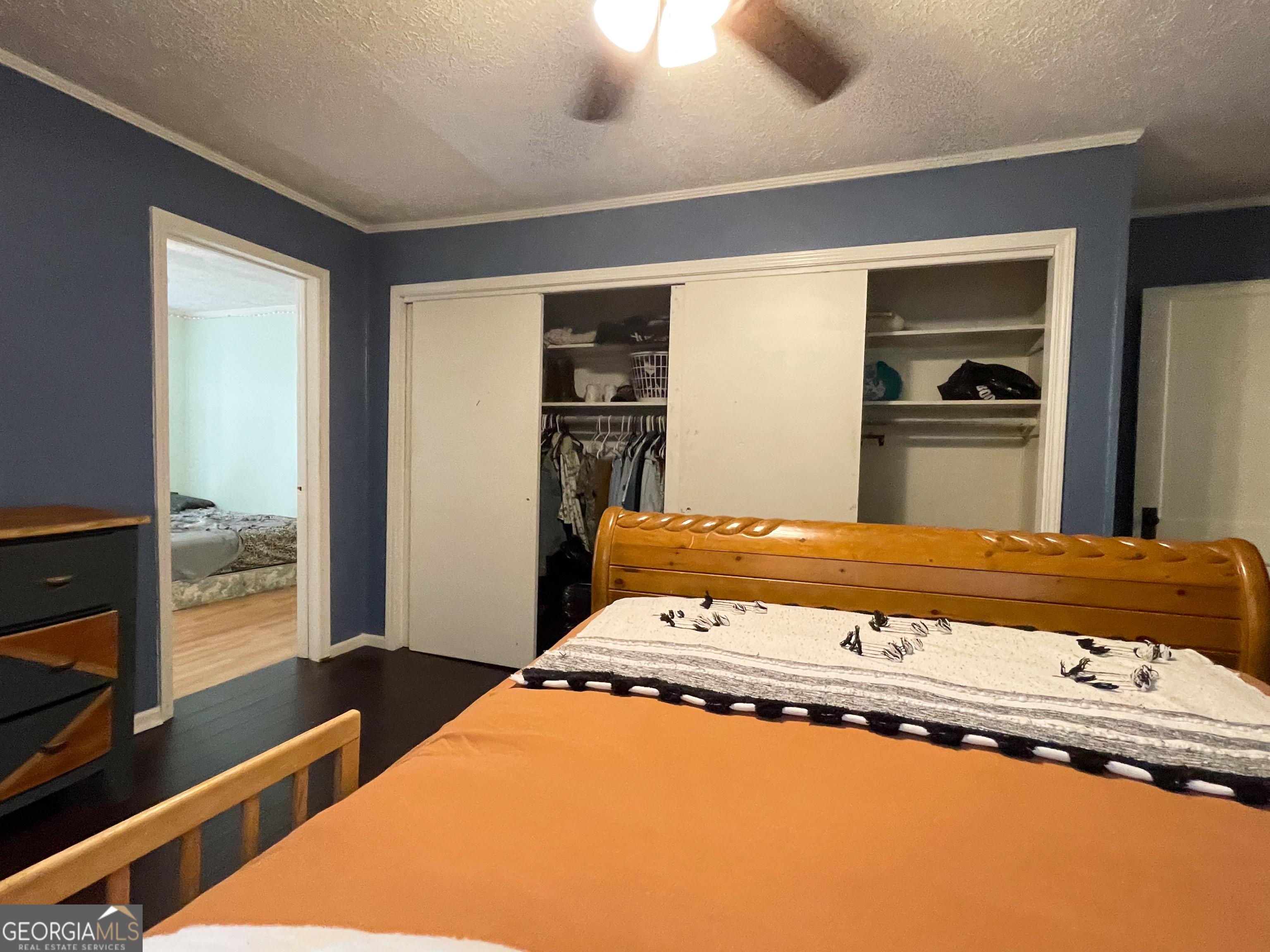 178 Mitchell Street Toccoa, GA 30577 - Photo 32 of 70 a bedroom with a bed and with view of living room