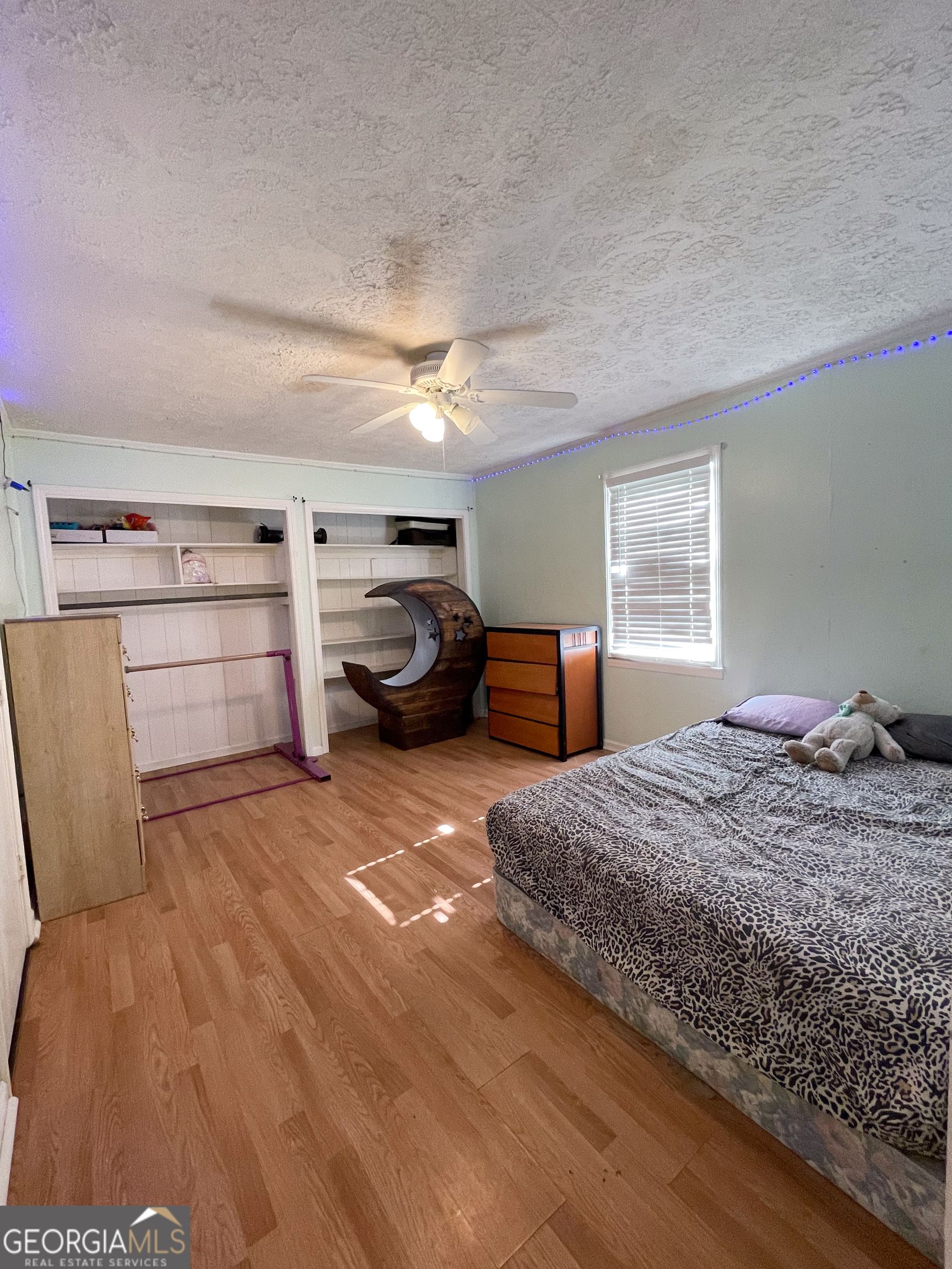 178 Mitchell Street Toccoa, GA 30577 - Photo 33 of 70 a bedroom with a large bed and window