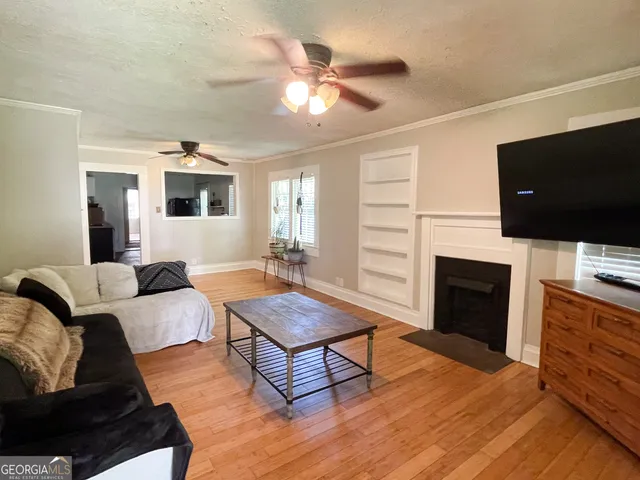 a bedroom with bed and window