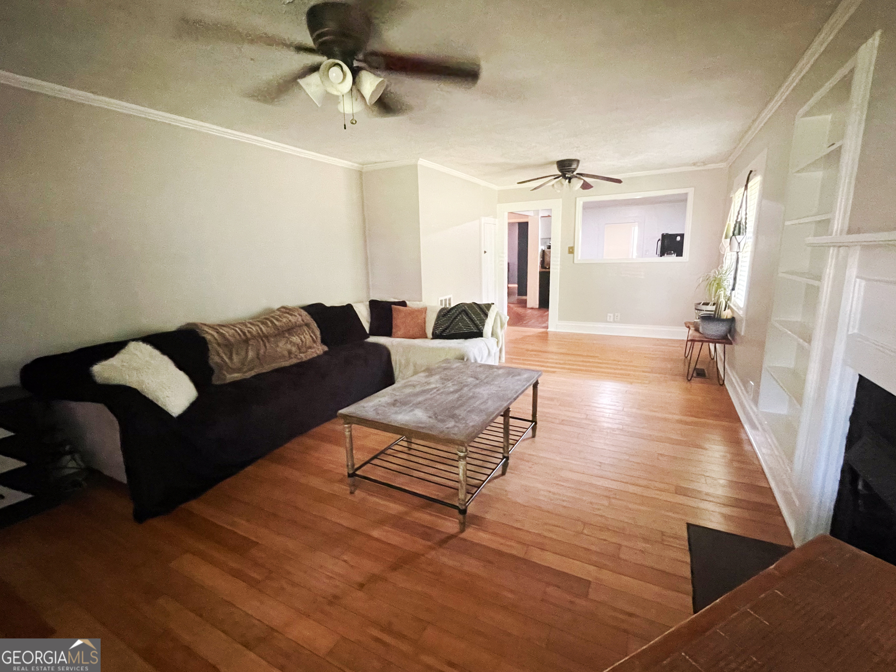 178 Mitchell Street Toccoa, GA 30577 - Photo 39 of 70 a living room with furniture and a wooden floor