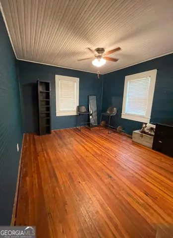 a view of a park with large trees