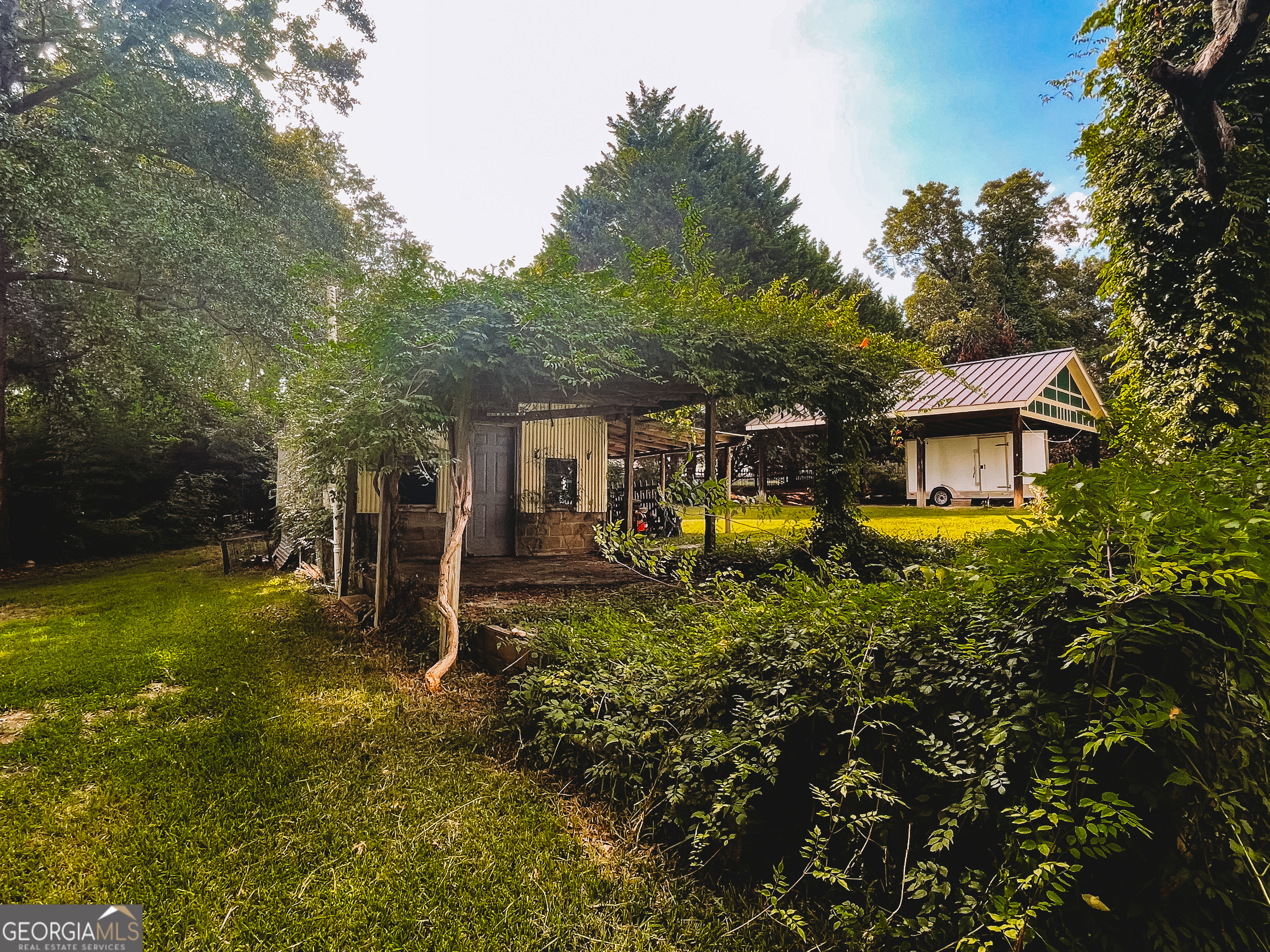178 Mitchell Street Toccoa, GA 30577 - Photo 69 of 70 a view of a house with pool and sitting area