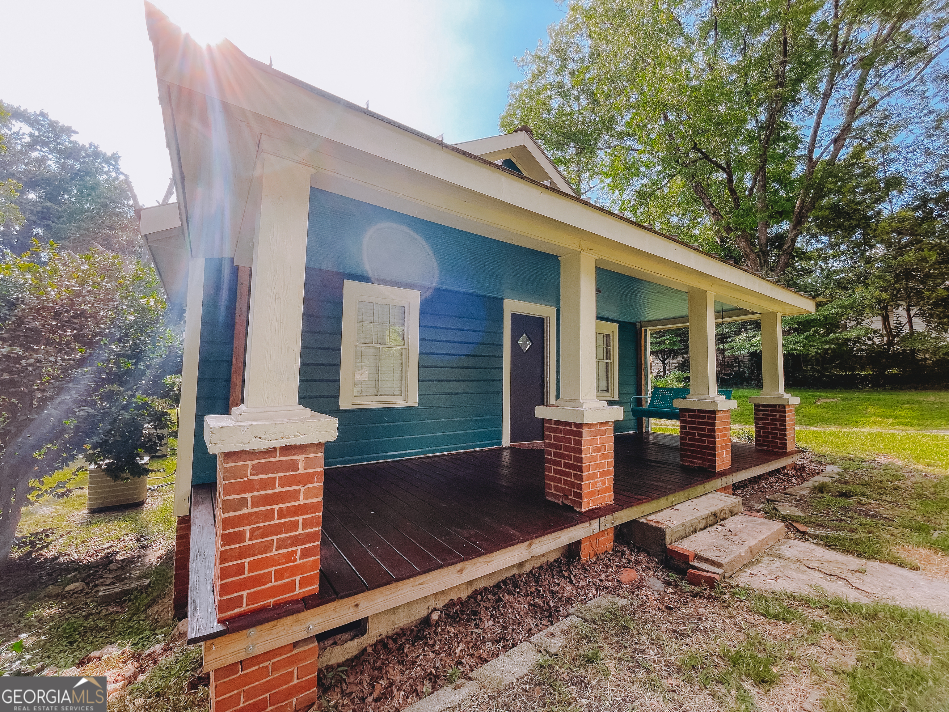 178 Mitchell Street Toccoa, GA 30577 - Photo 10 of 70 a front view of a house with garden
