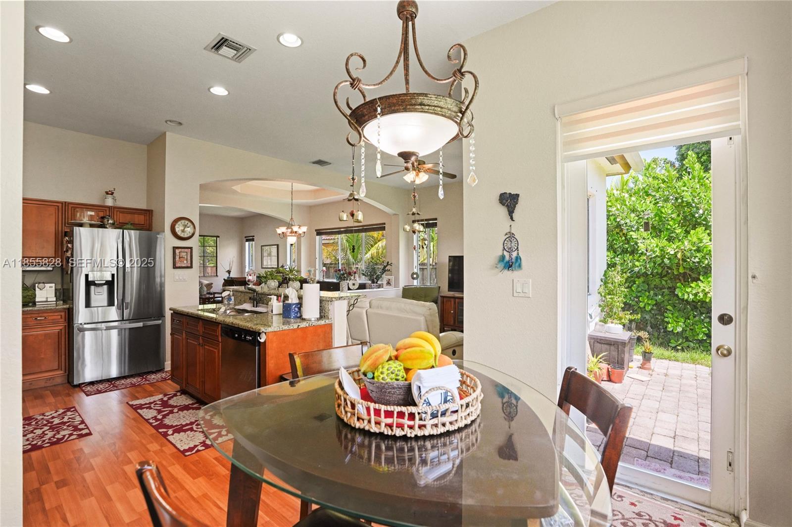 9506 Southwest 220th Lane Cutler Bay, FL 33190 - Photo 15 of 51 a kitchen with a refrigerator and a stove