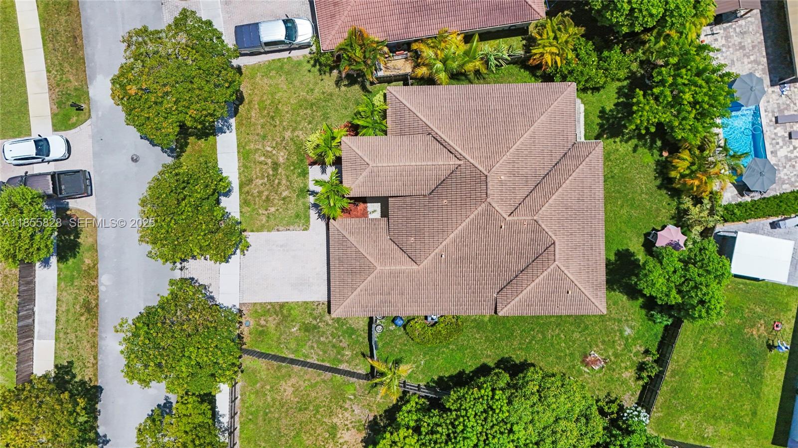 9506 Southwest 220th Lane Cutler Bay, FL 33190 - Photo 2 of 51 an aerial view of a house