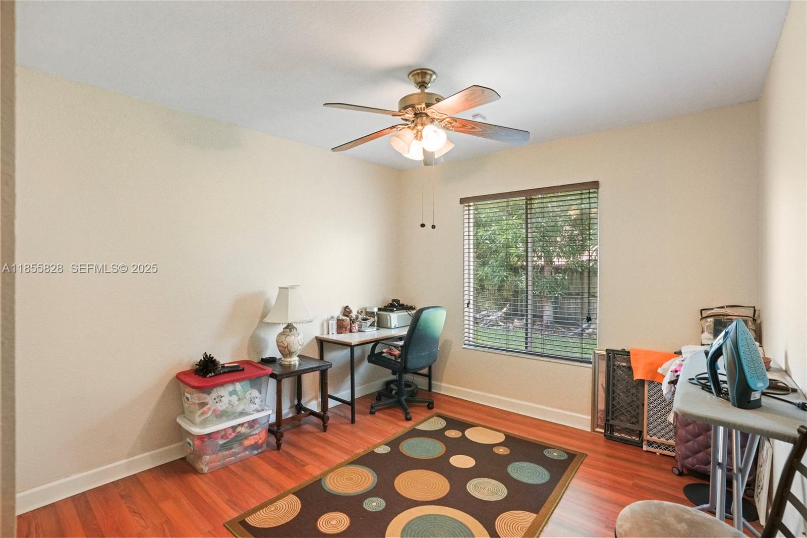 9506 Southwest 220th Lane Cutler Bay, FL 33190 - Photo 35 of 51 a living room with furniture and a window
