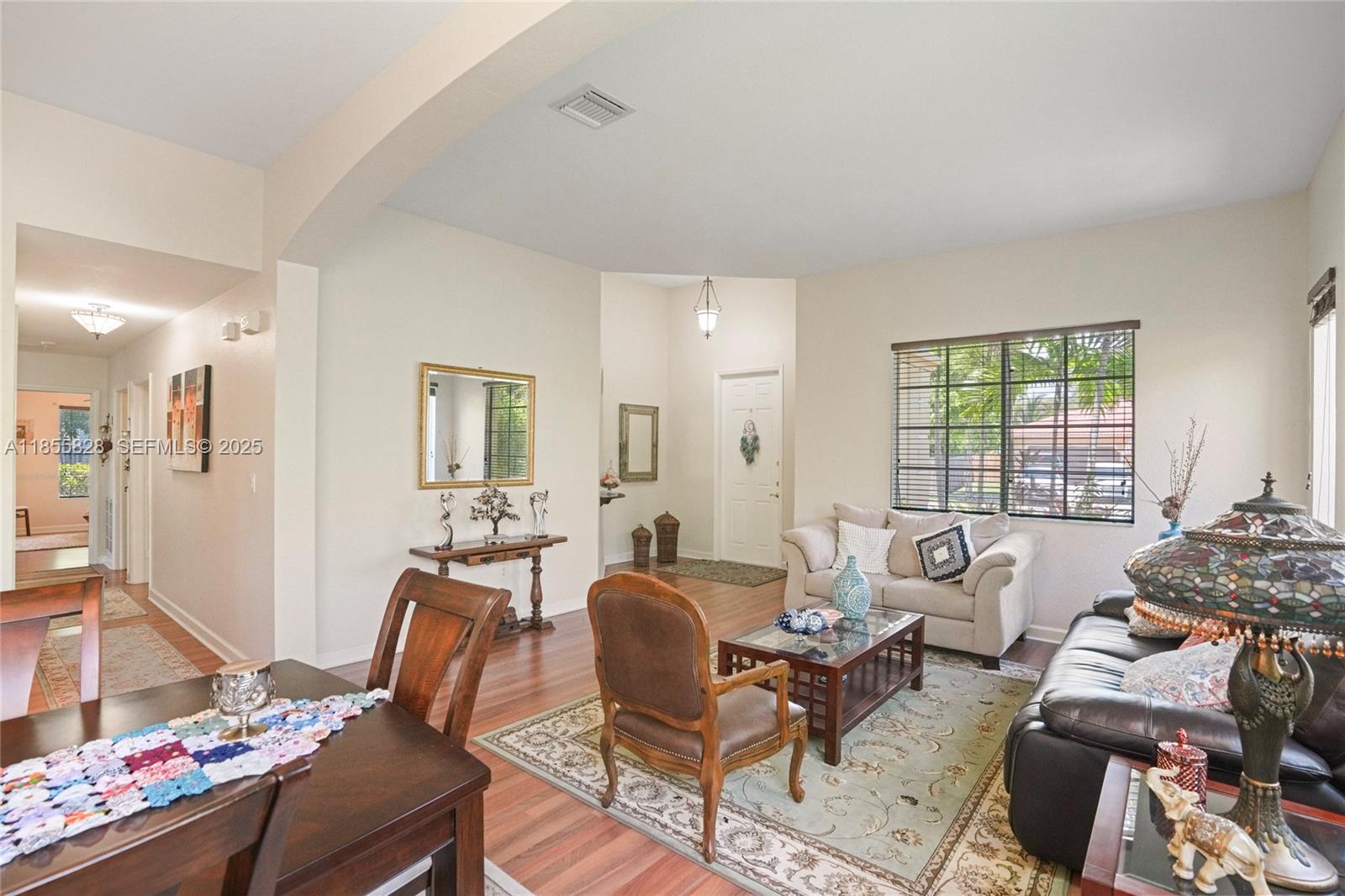 9506 Southwest 220th Lane Cutler Bay, FL 33190 - Photo 45 of 51 a living room with furniture and a window