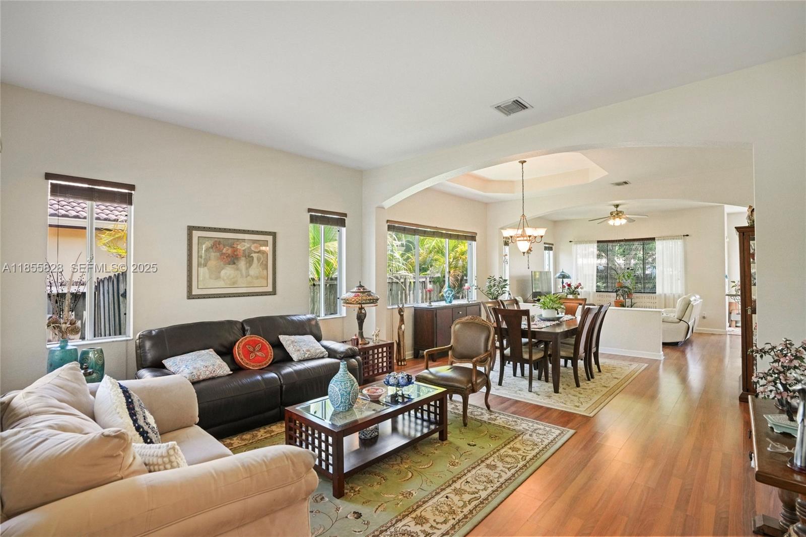 9506 Southwest 220th Lane Cutler Bay, FL 33190 - Photo 5 of 51 a living room with furniture and a large window