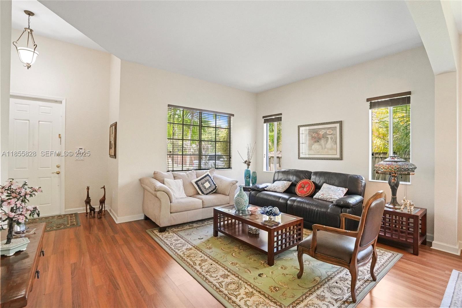 9506 Southwest 220th Lane Cutler Bay, FL 33190 - Photo 7 of 51 a living room with furniture and a window