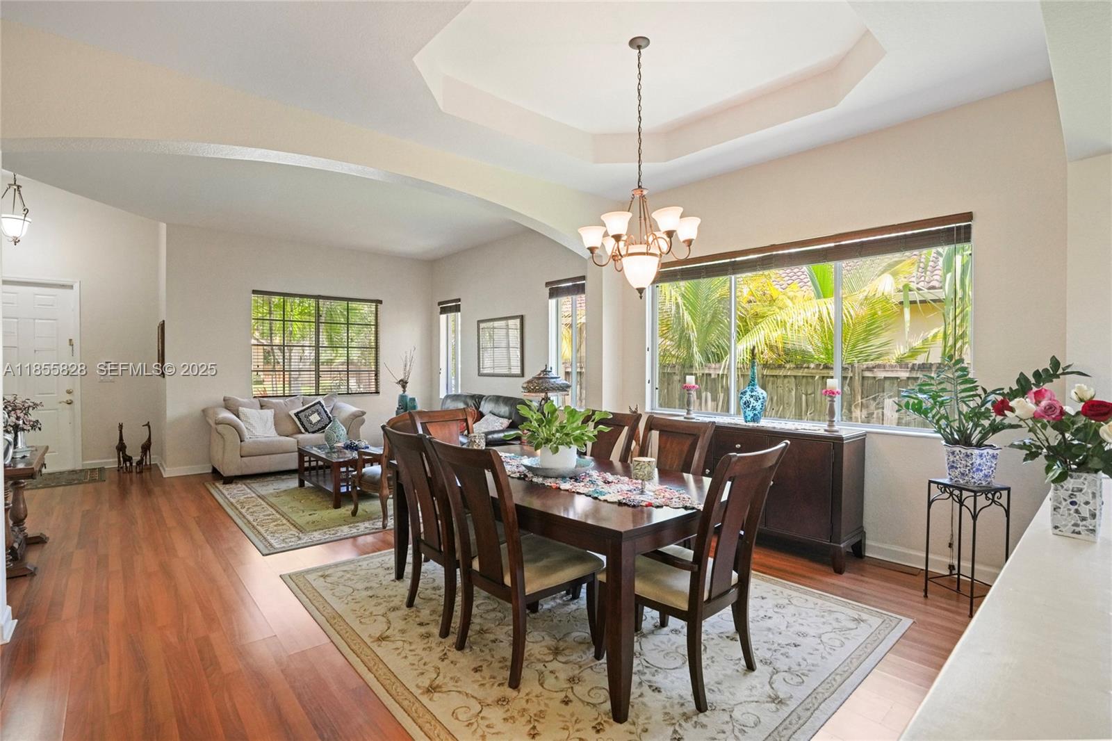 9506 Southwest 220th Lane Cutler Bay, FL 33190 - Photo 9 of 51 a view of a dining room with furniture window and outside view