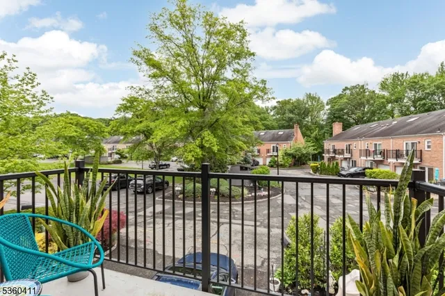 a view of a balcony with lake view