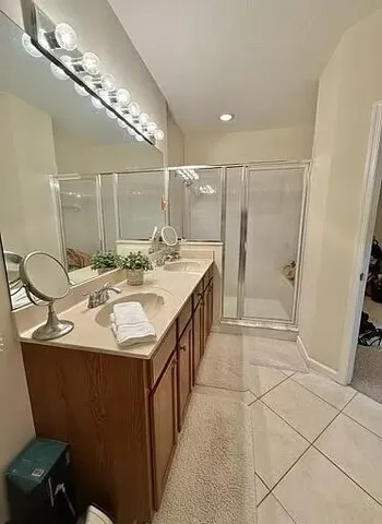 a utility room with a sink a washer and dryer