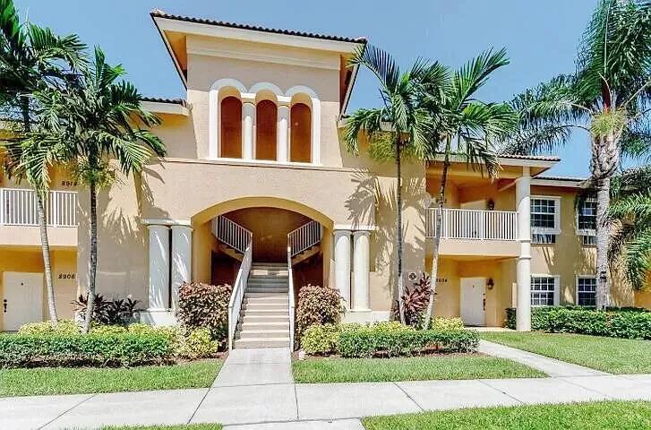 8356 Mulligan Circle, Unit 1924A Port St. Lucie, FL 34986 - Photo 2 of 15 front view of a house