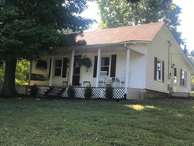 11665 Owens Chapel Road Springfield, TN 37172 - Photo 1 of 25 a front view of a house with garden
