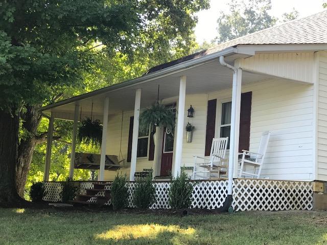 11665 Owens Chapel Road Springfield, TN 37172 - Photo 2 of 25 a front view of a house with a yard