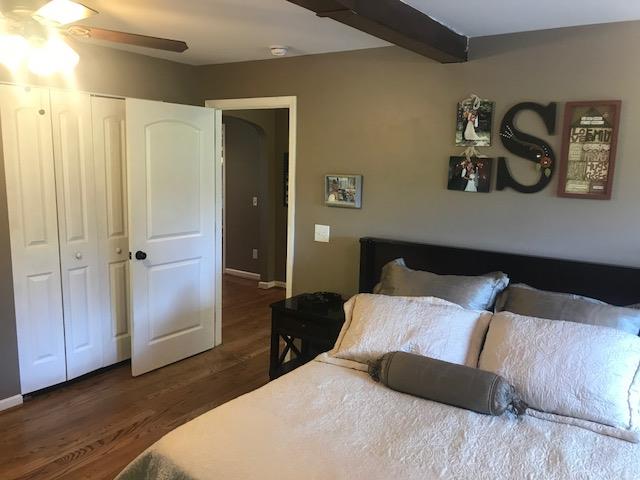 11665 Owens Chapel Road Springfield, TN 37172 - Photo 15 of 25 a bedroom with a bed and painting on the wall