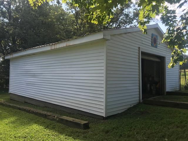 11665 Owens Chapel Road Springfield, TN 37172 - Photo 20 of 25 a backyard of a house