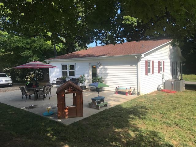 11665 Owens Chapel Road Springfield, TN 37172 - Photo 21 of 25 a front view of house with yard outdoor seating and barbeque oven