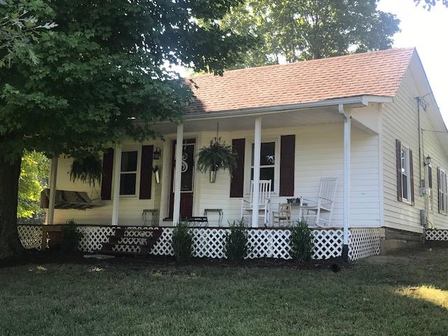 11665 Owens Chapel Road Springfield, TN 37172 - Photo 23 of 25 front view of a house with a garden