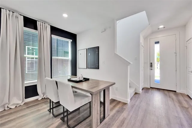 a view of a dining room with furniture