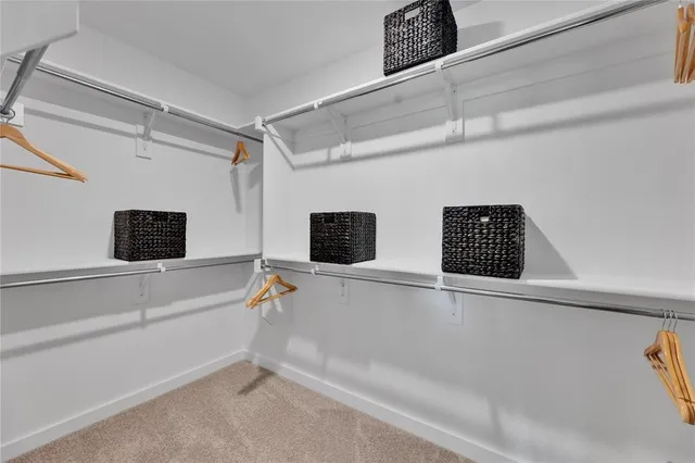 a bathroom with a double vanity sink and mirror