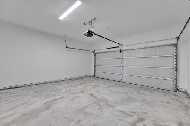 a view of storage and utility room with washer and dryer