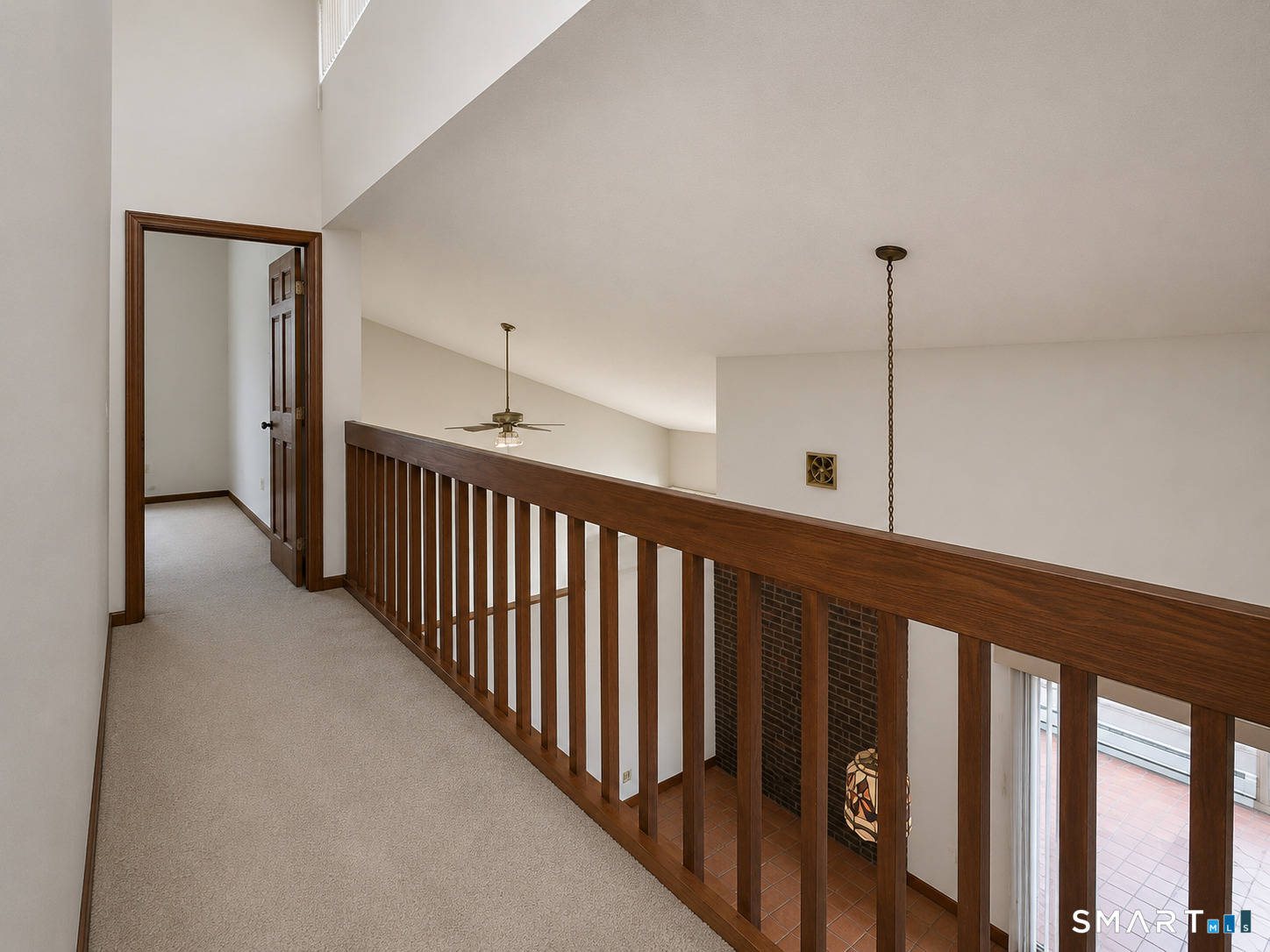 4 Ta'Agan Point Road Danbury, CT 06811 - Photo 12 of 22 a view of a hallway with windows