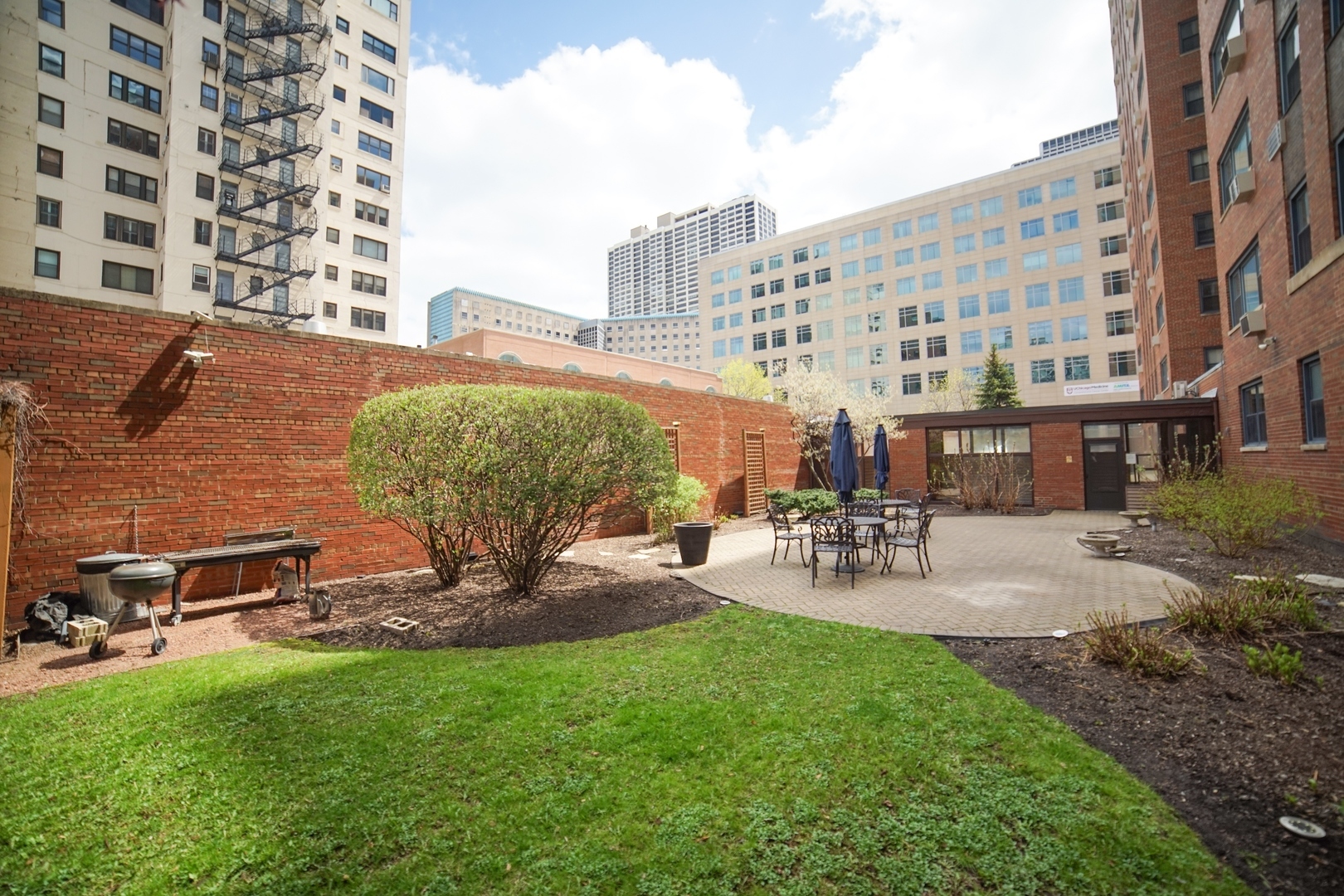 Undisclosed Address Chicago, IL 60657 - Photo 17 of 18 a view of a building and outdoor space