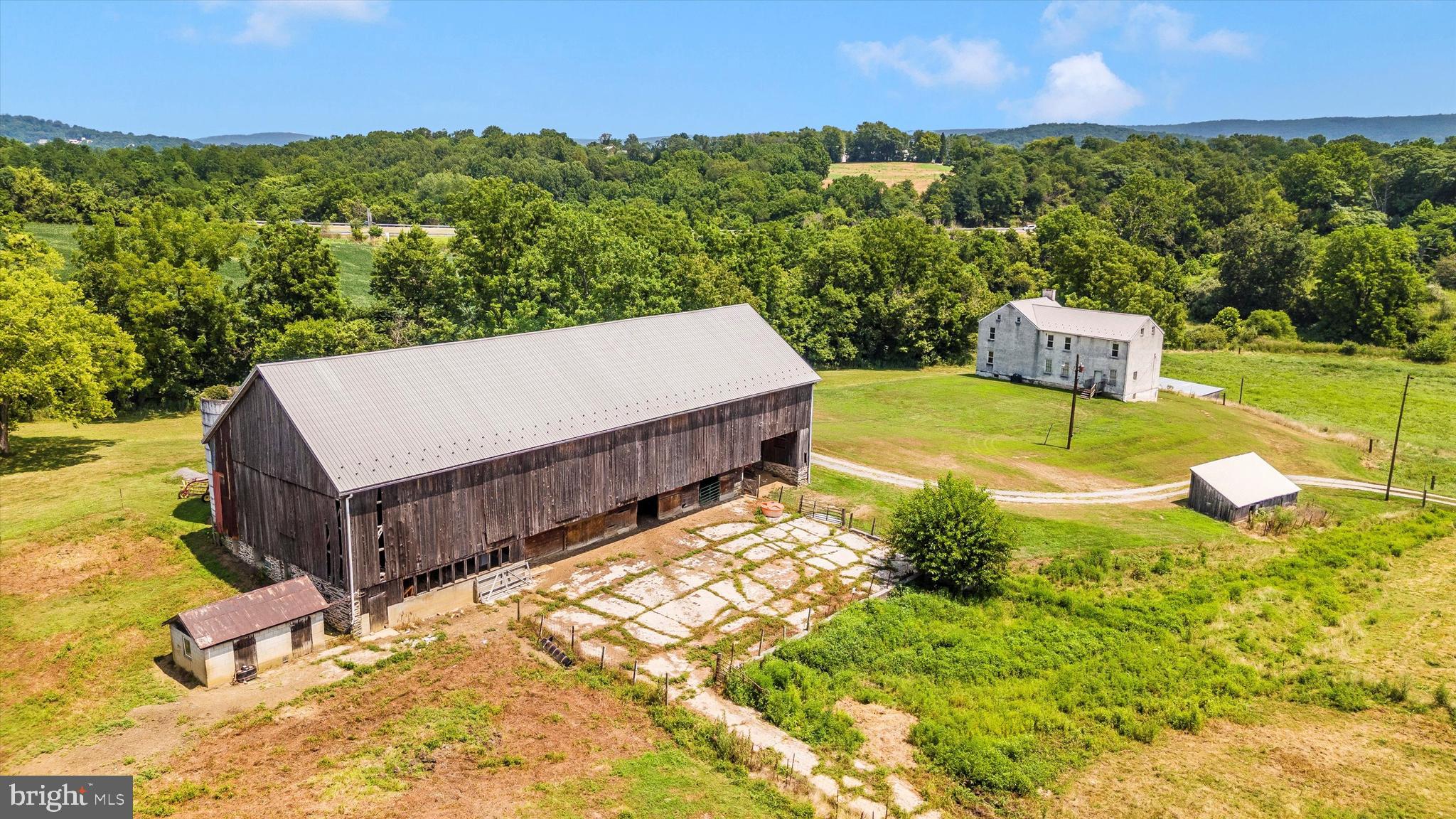 2820 Milt Summers Road Middletown, MD 21769 - Photo 13 of 88 a view of a house with a yard and sitting area