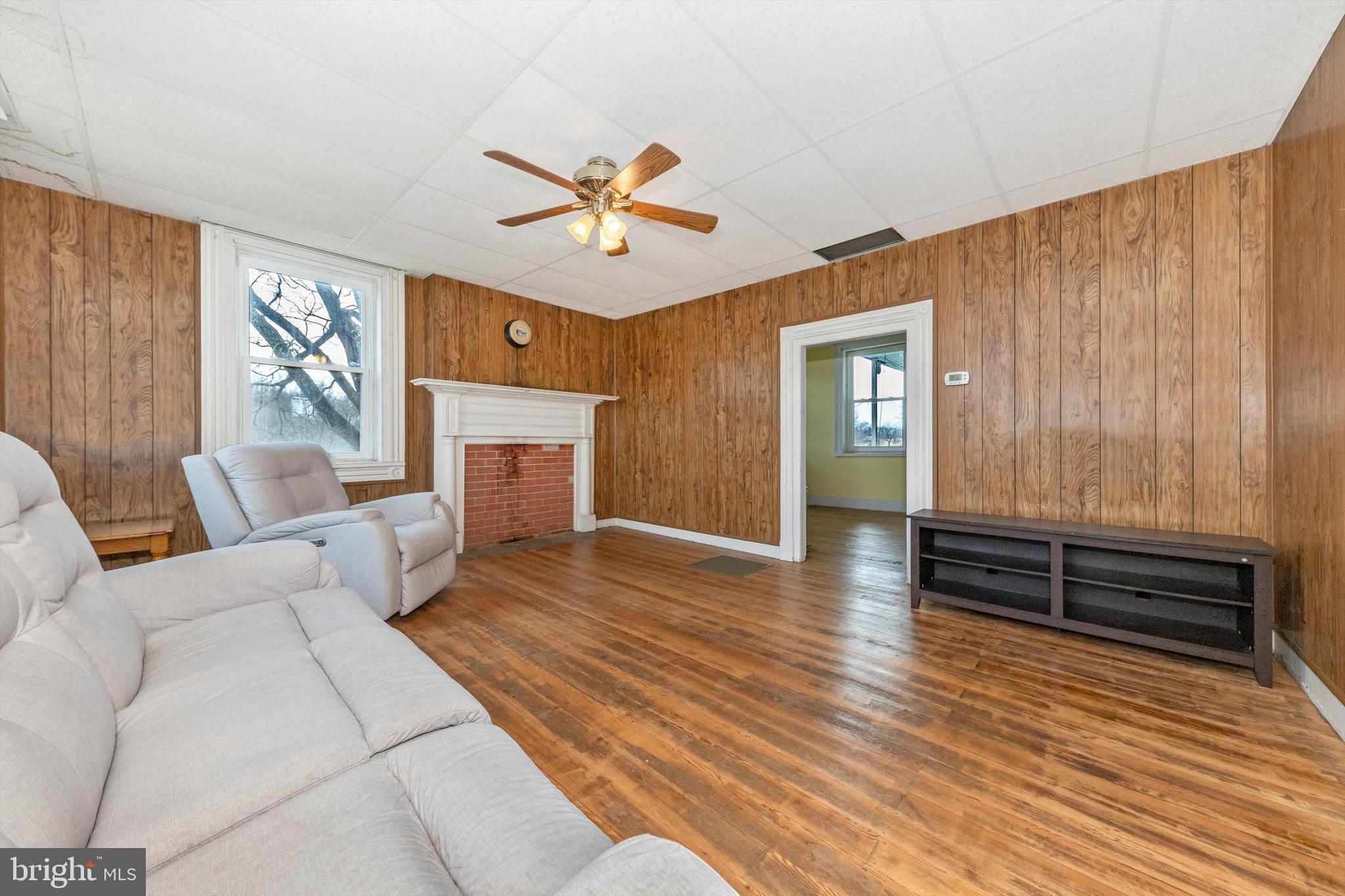 2820 Milt Summers Road Middletown, MD 21769 - Photo 28 of 88 a living room with furniture and a fireplace