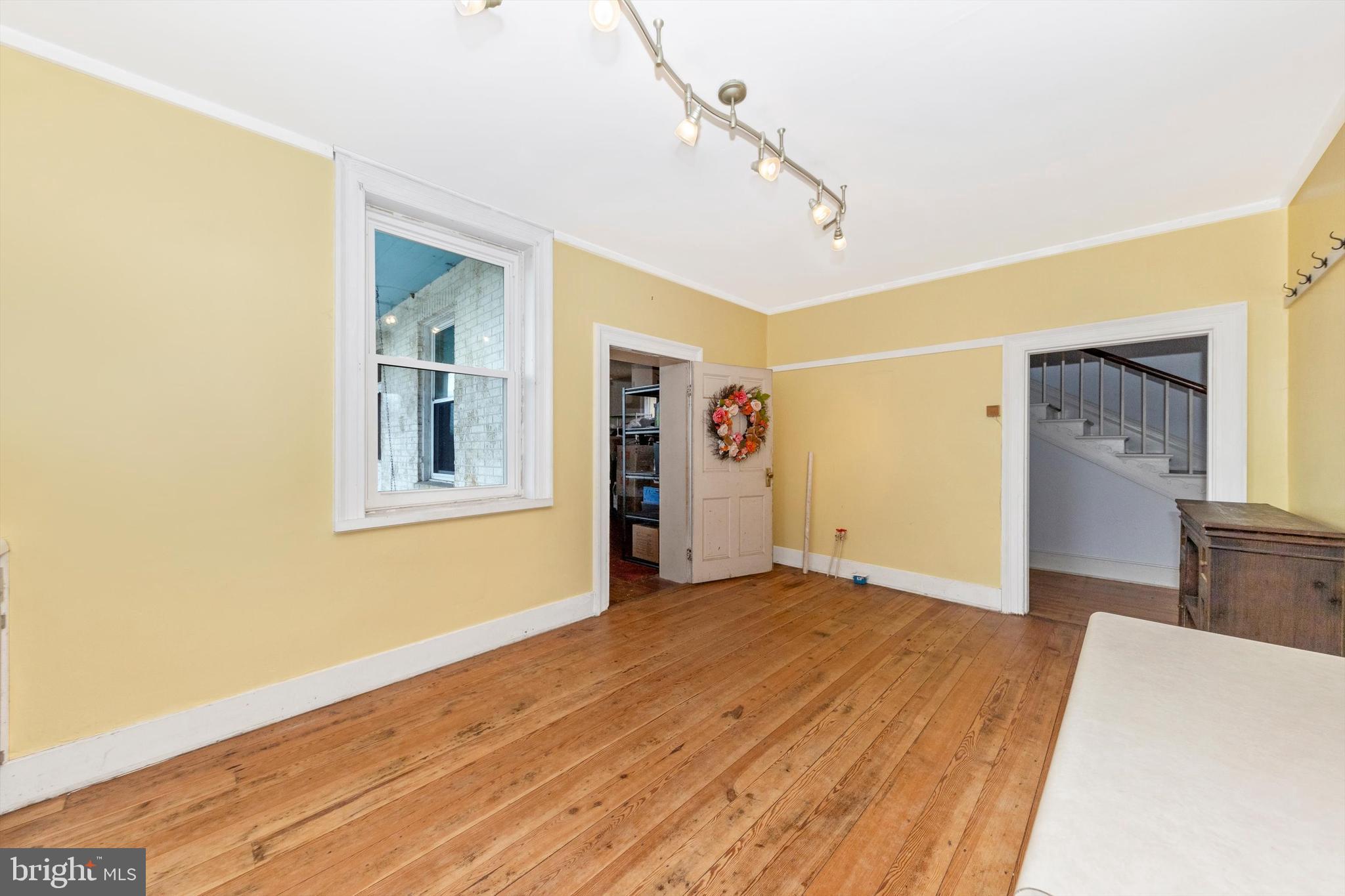 2820 Milt Summers Road Middletown, MD 21769 - Photo 32 of 88 a view of empty room with wooden floor and fan