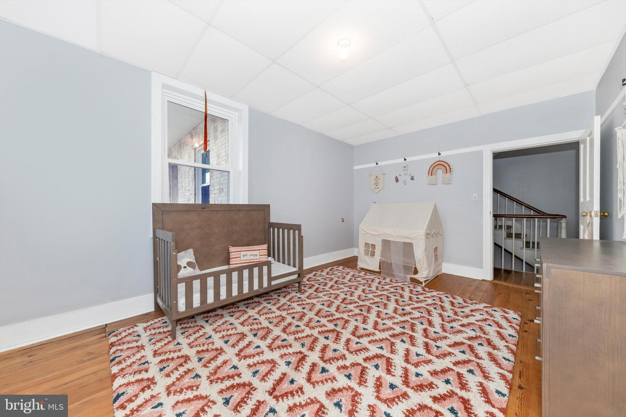 2820 Milt Summers Road Middletown, MD 21769 - Photo 40 of 88 a living room with a couch and a rug
