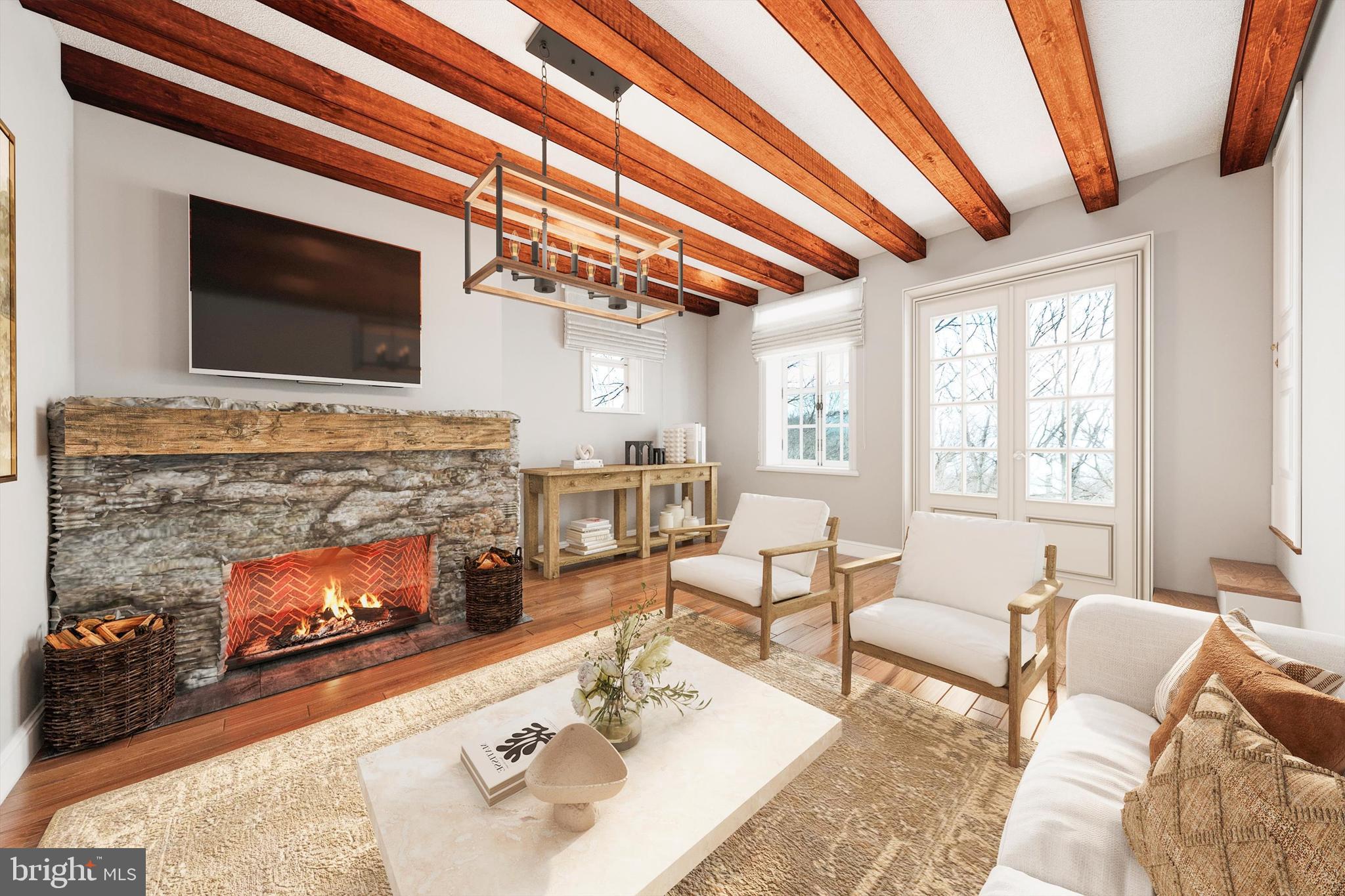 2820 Milt Summers Road Middletown, MD 21769 - Photo 47 of 88 a living room with furniture and a fireplace