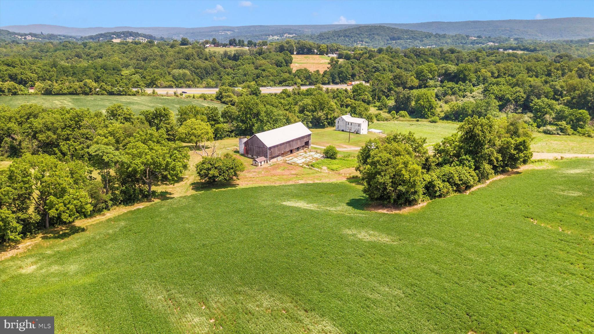 2820 Milt Summers Road Middletown, MD 21769 - Photo 10 of 88 a view of a lake with a mountain in the background