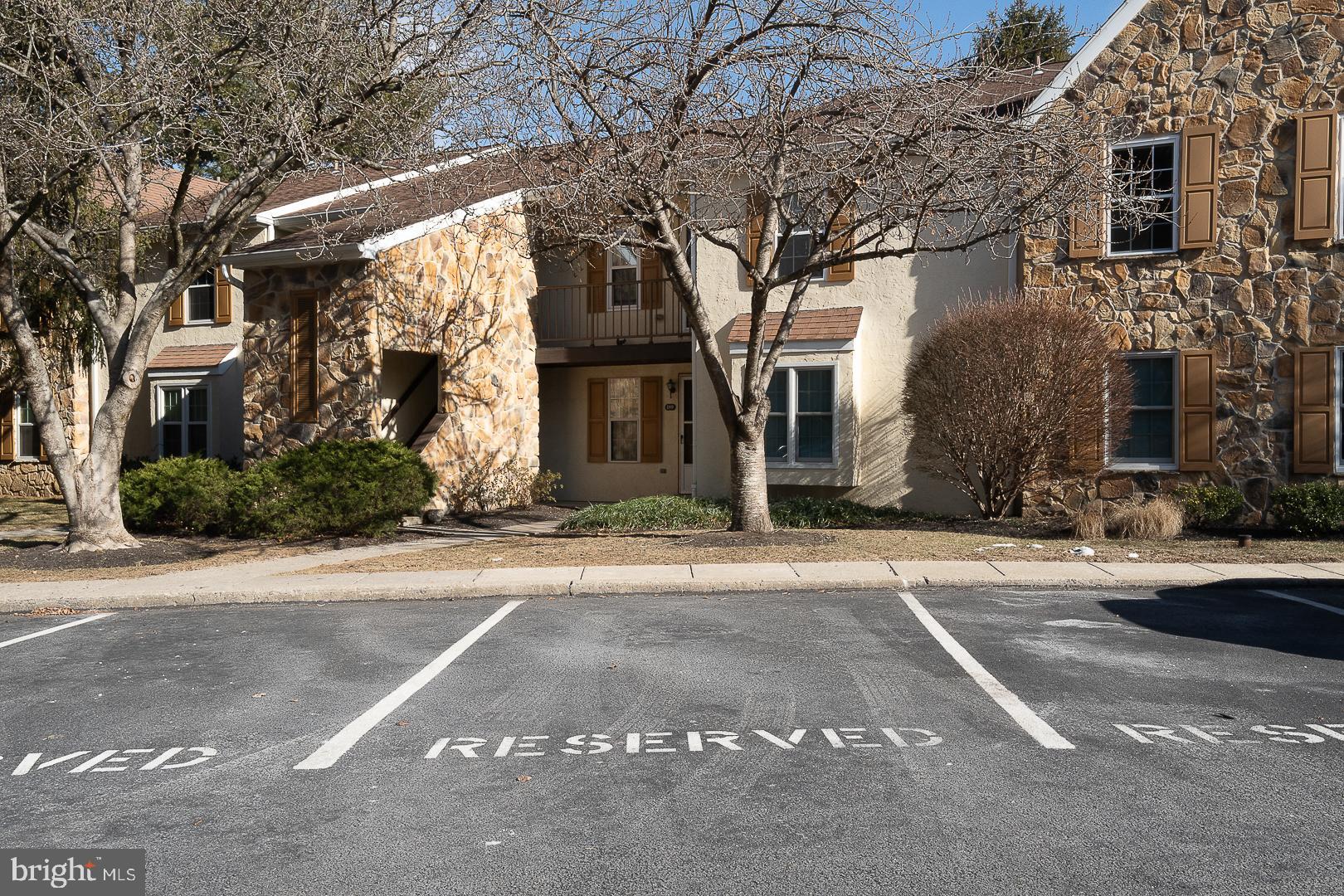 189 Valley Stream Lane Chesterbrook, PA 19087 - Photo 22 of 22 front view of a building with a street