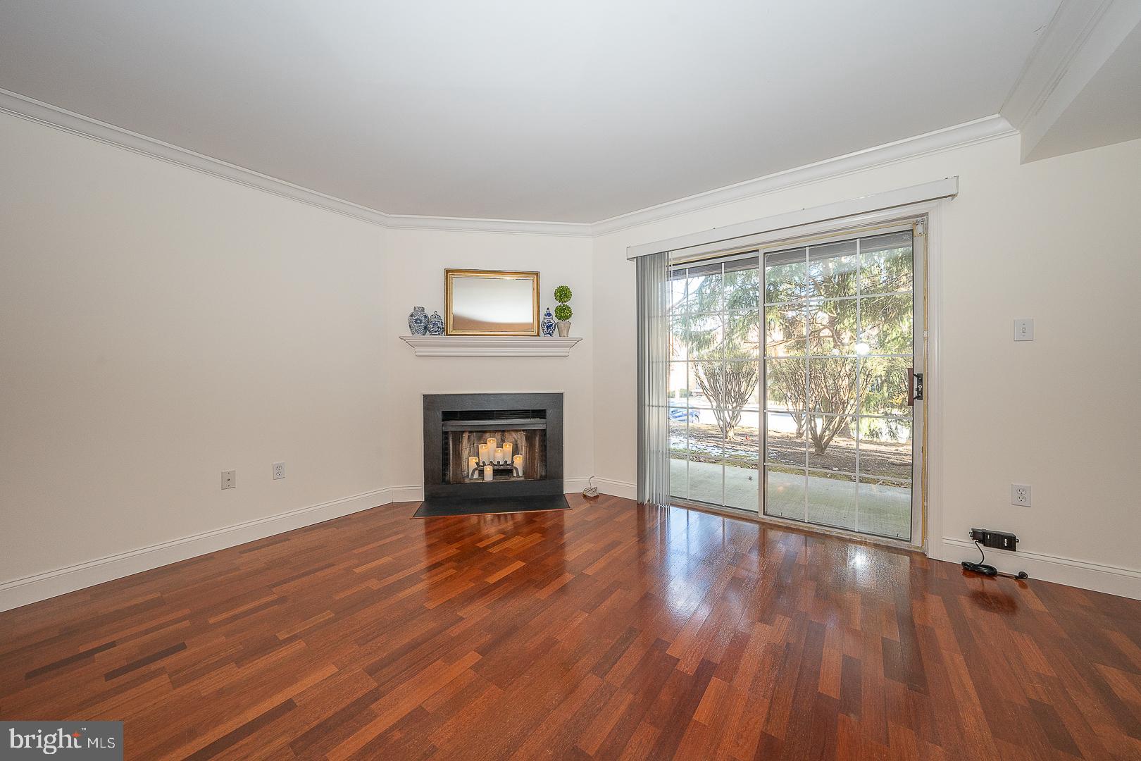 189 Valley Stream Lane Chesterbrook, PA 19087 - Photo 5 of 22 a view of an empty room with wooden floor and a window