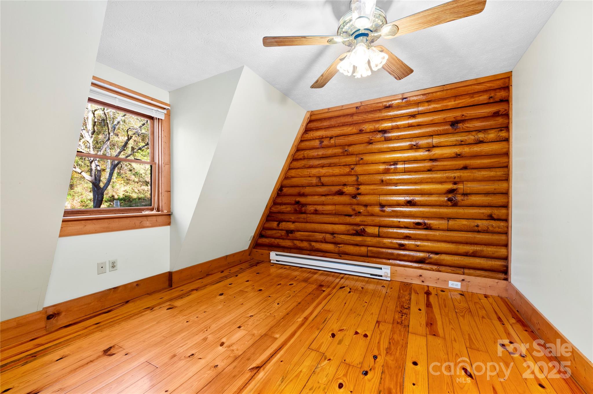 5 Rustic Rdg Drive Candler, NC 28715 - Photo 11 of 17 a view of empty room with window and ceiling fan