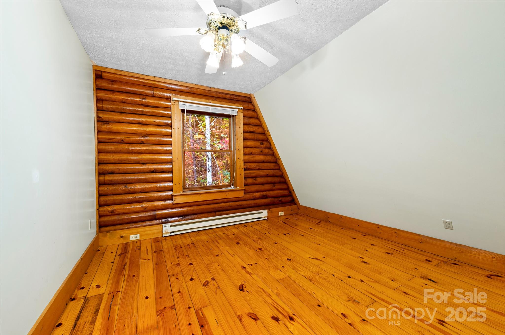 5 Rustic Rdg Drive Candler, NC 28715 - Photo 12 of 17 a view of a hallway with a chandelier