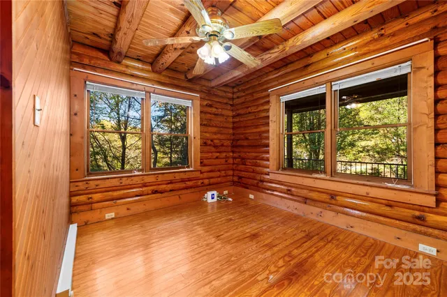 a view of a room with a large window